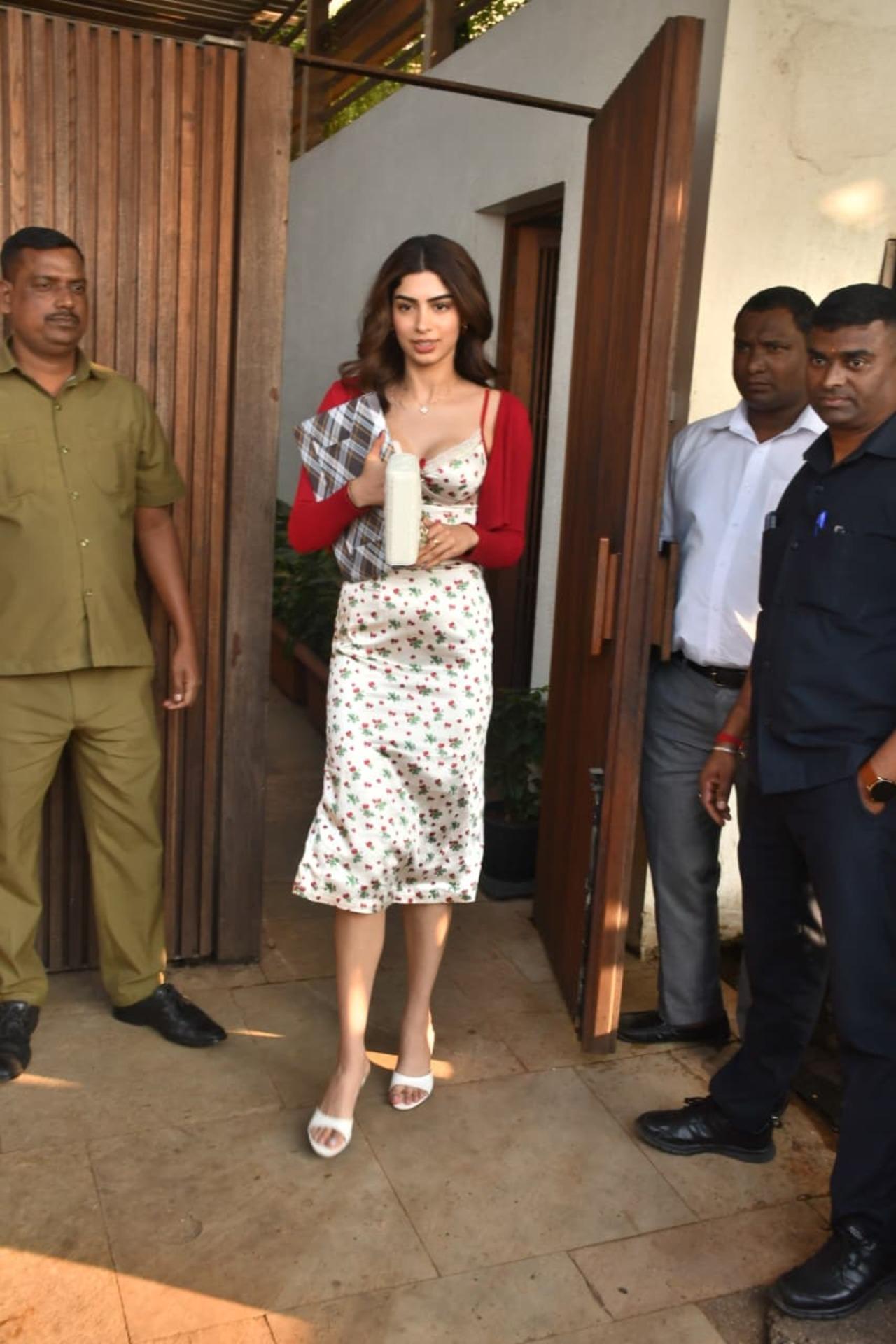 Actress Khushi Kapoor looked gorgeous as ever in a white dress and red jacket for the Christmas bash